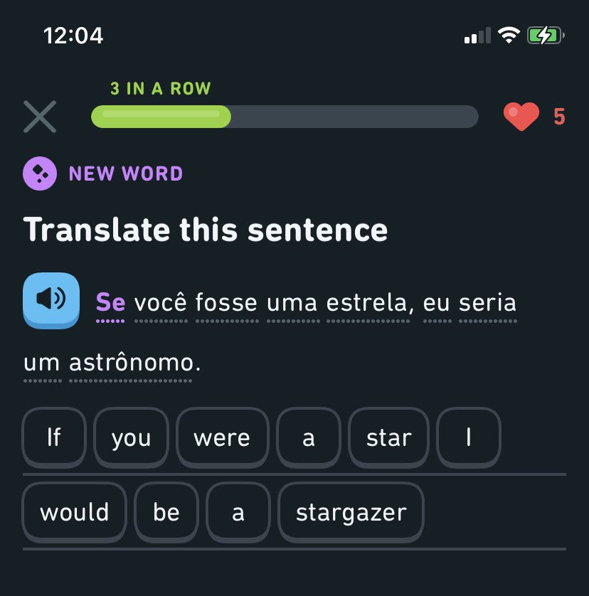 A Duolingo screenshot of a sentence in Portuguese, the English translation says if you were a star, I would be a stargazer